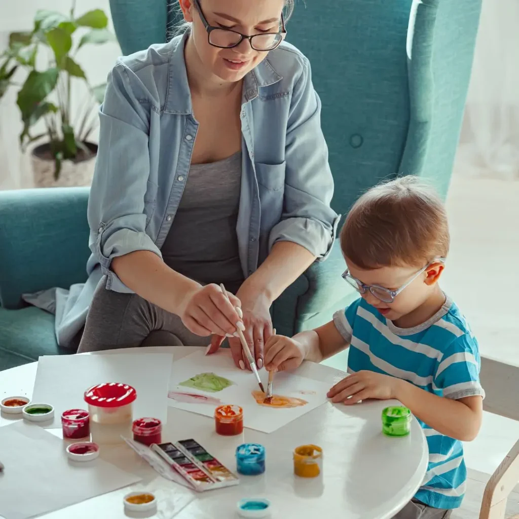 An image of A child painting