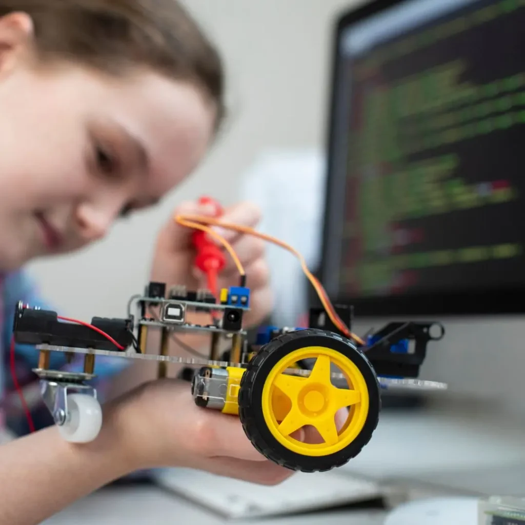 An Image of A girl playing With Stem Toy