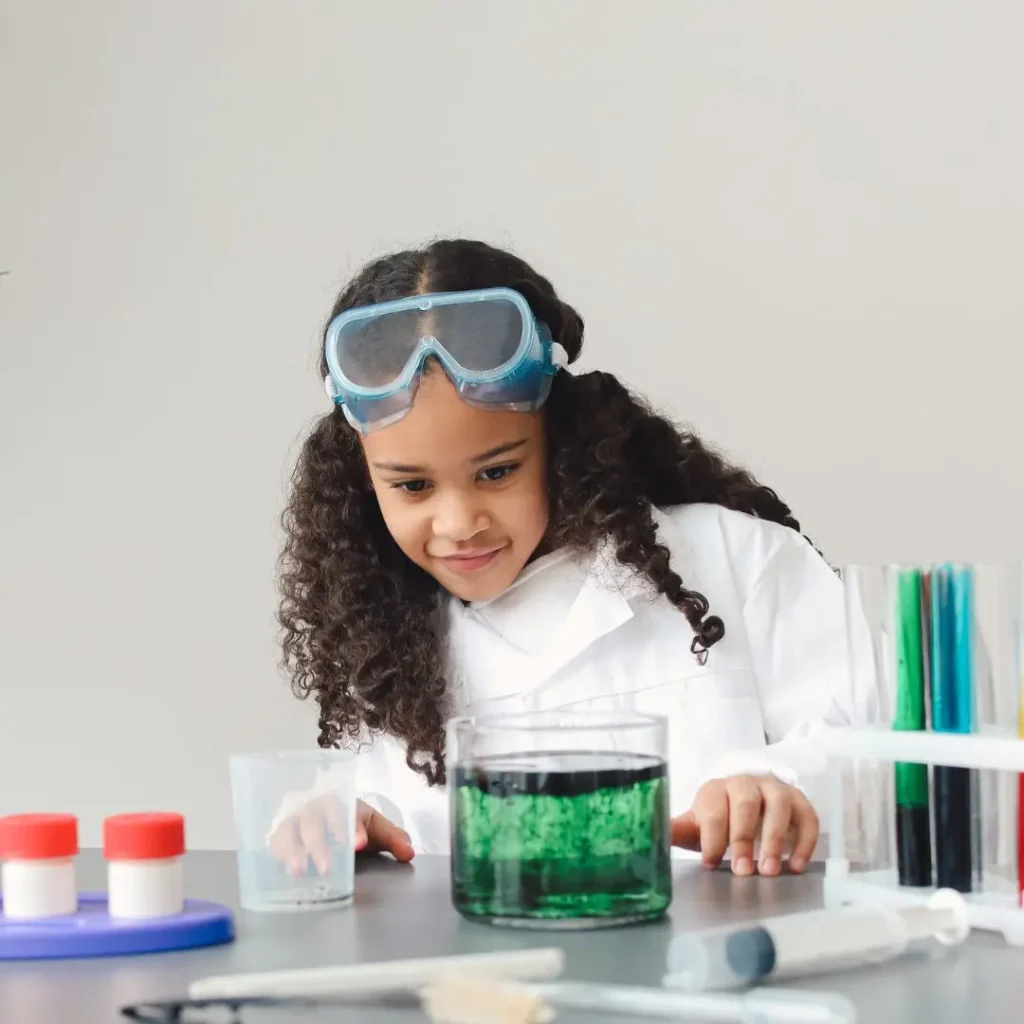 A girl doing science experiments