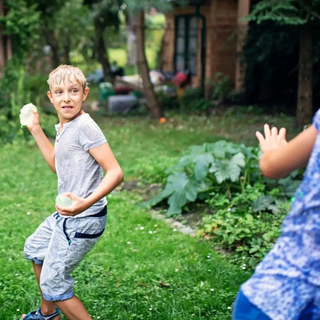 Image of Kids Playing with water Balloon