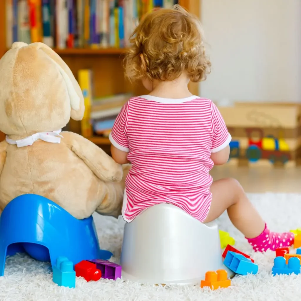 An image of Toddler playing with a toy 