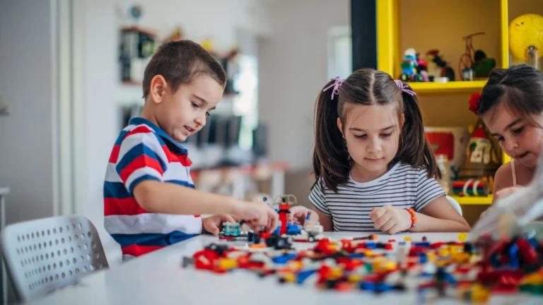 An image of 3 kids playing with toys