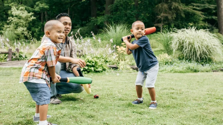 An image of a toddlers playing with sports toys