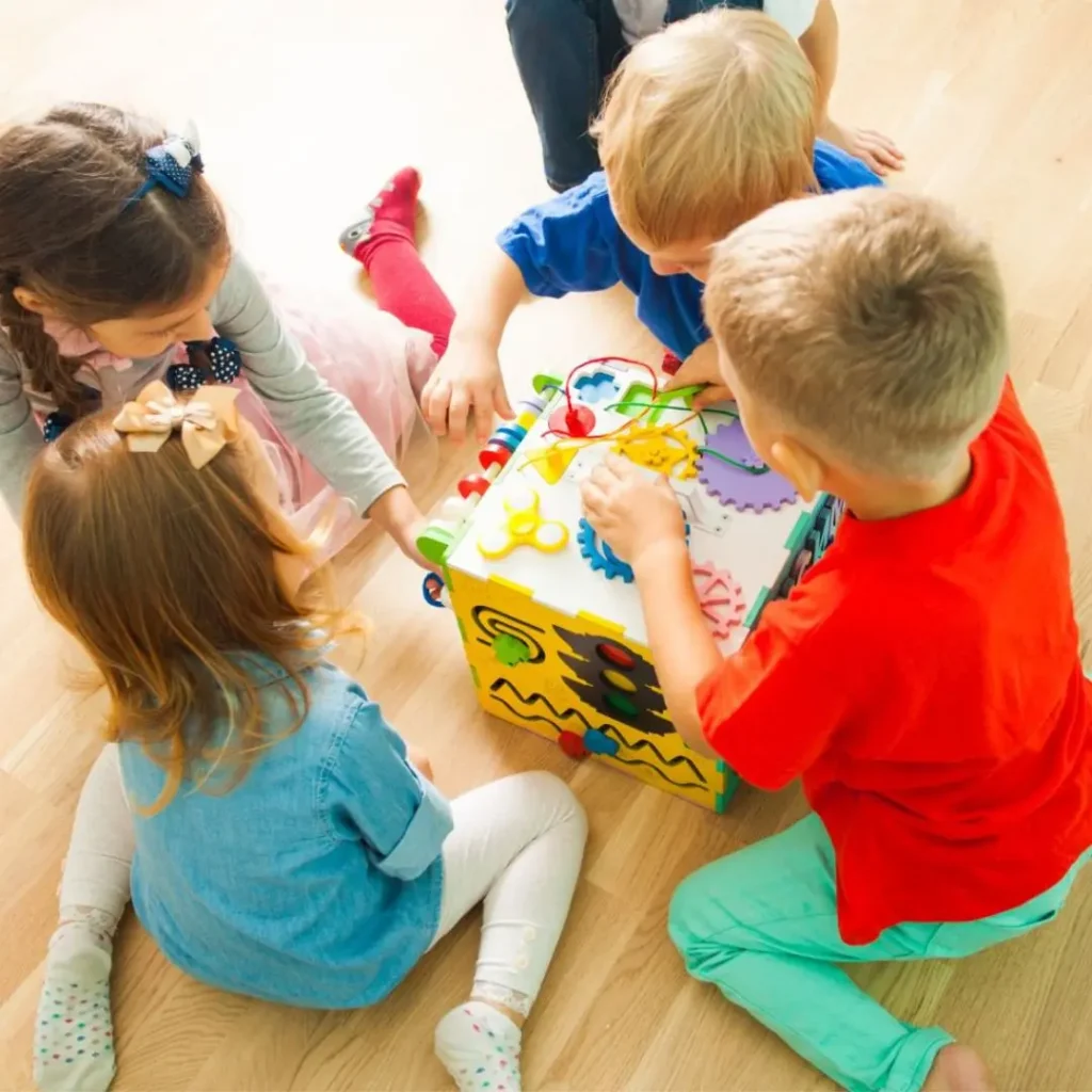 An image of several Kids Playing with Toys